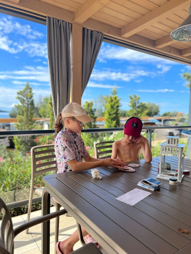 Children playing games at Valamar Istra Camping self catering holiday home in Funtana near Porec