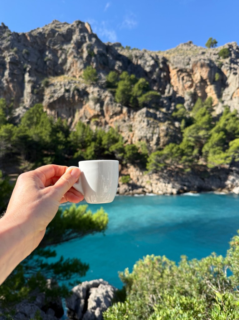 view from sa calobra beach with espresso coffee