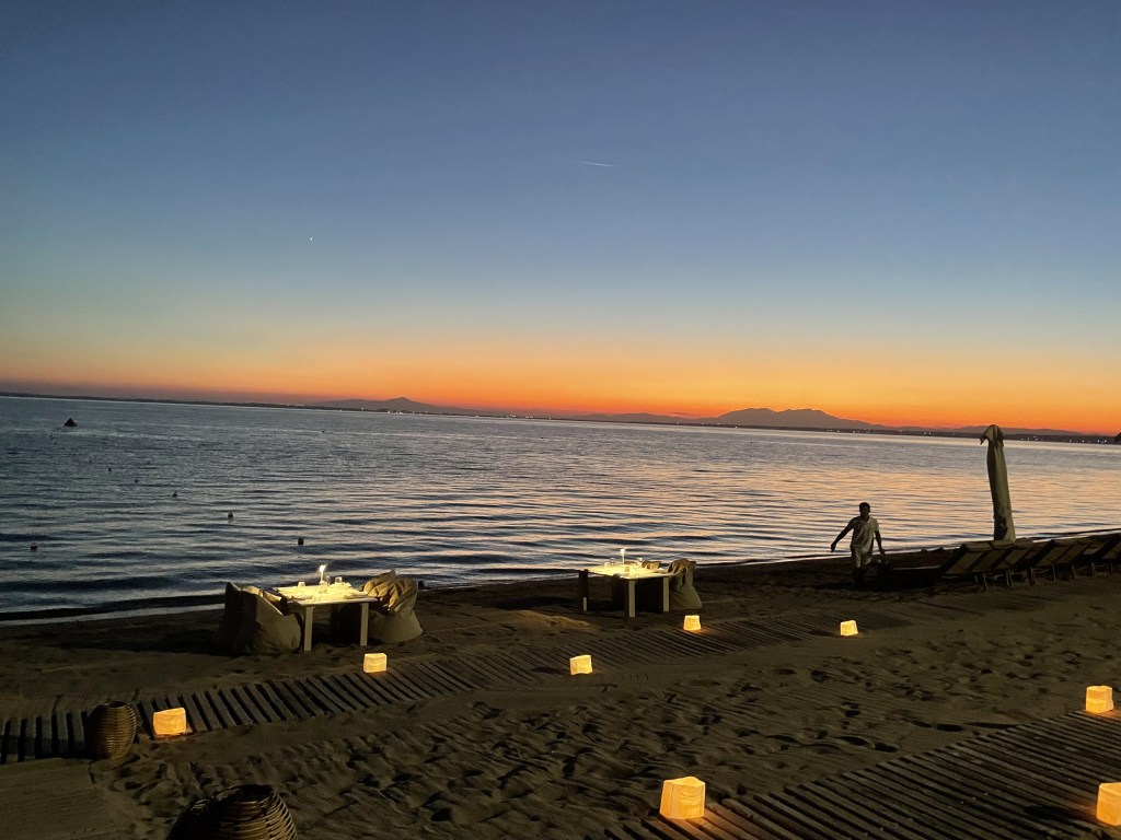 Dinner on the beach at sunset at Ikos Olivia